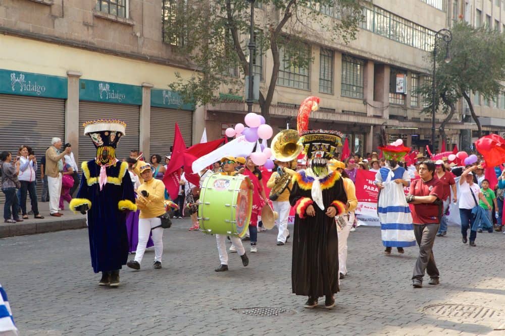 People in costume in Downtown Mexico City parade