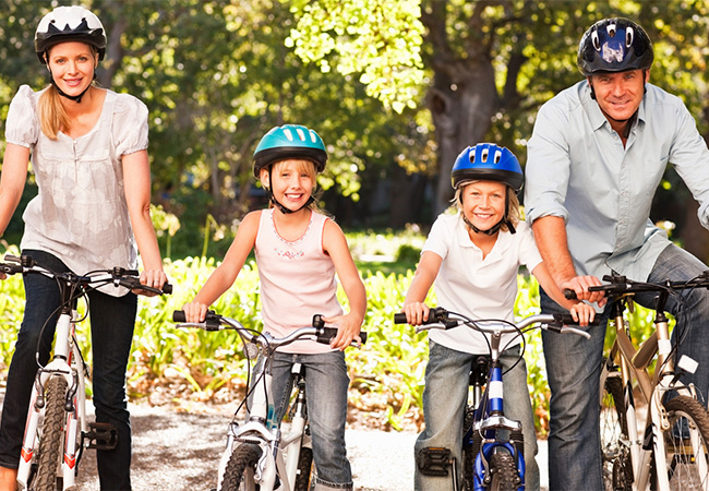 Bicycling family in Central Park in New York