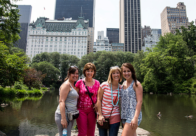 Family at pond in Central Park New York
