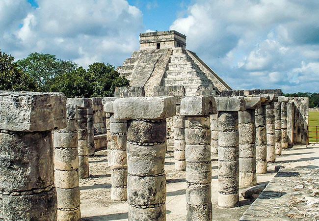 Stone ruins and pillars of Chichen Itza in Cancun