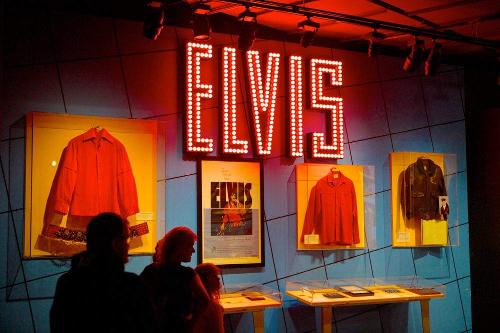 An Elvis exhibit at the Rock & Roll Hall of Fame with pieces of Elvis’s clothing