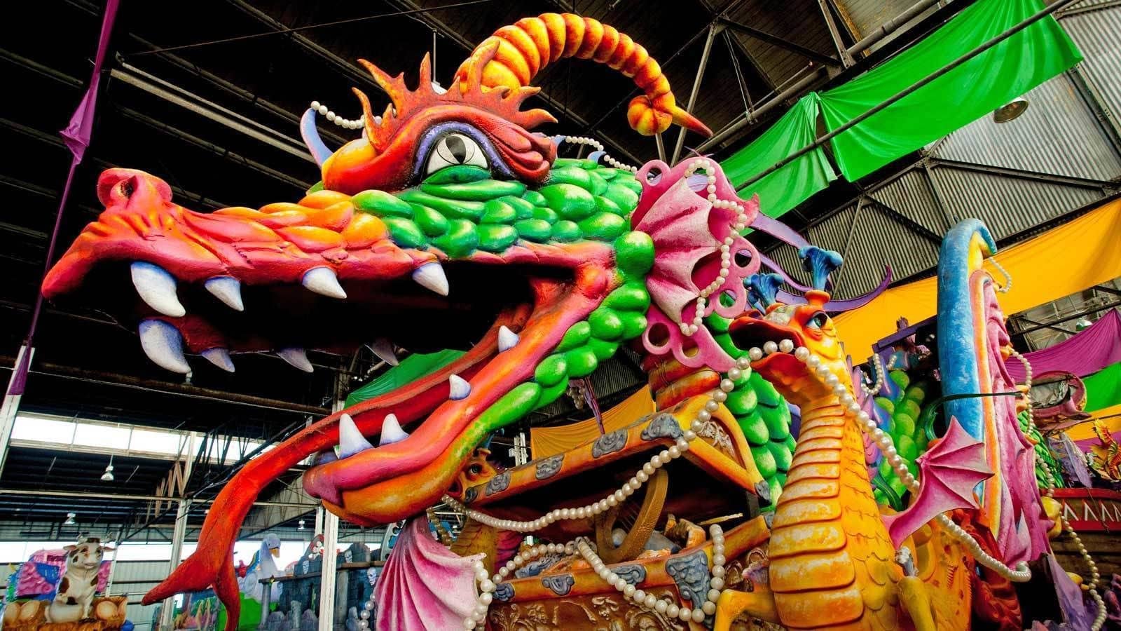 Colorful dragon parade float being made at Mardi Gras World in New Orleans