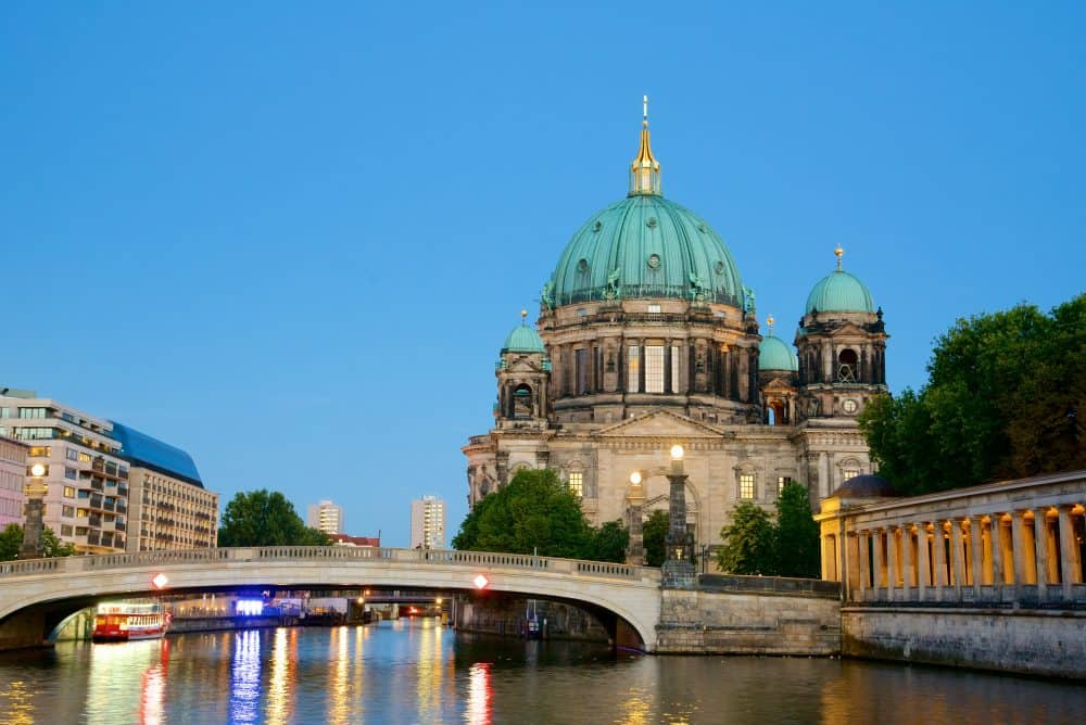 Bridge and buildings in Mitte in evening