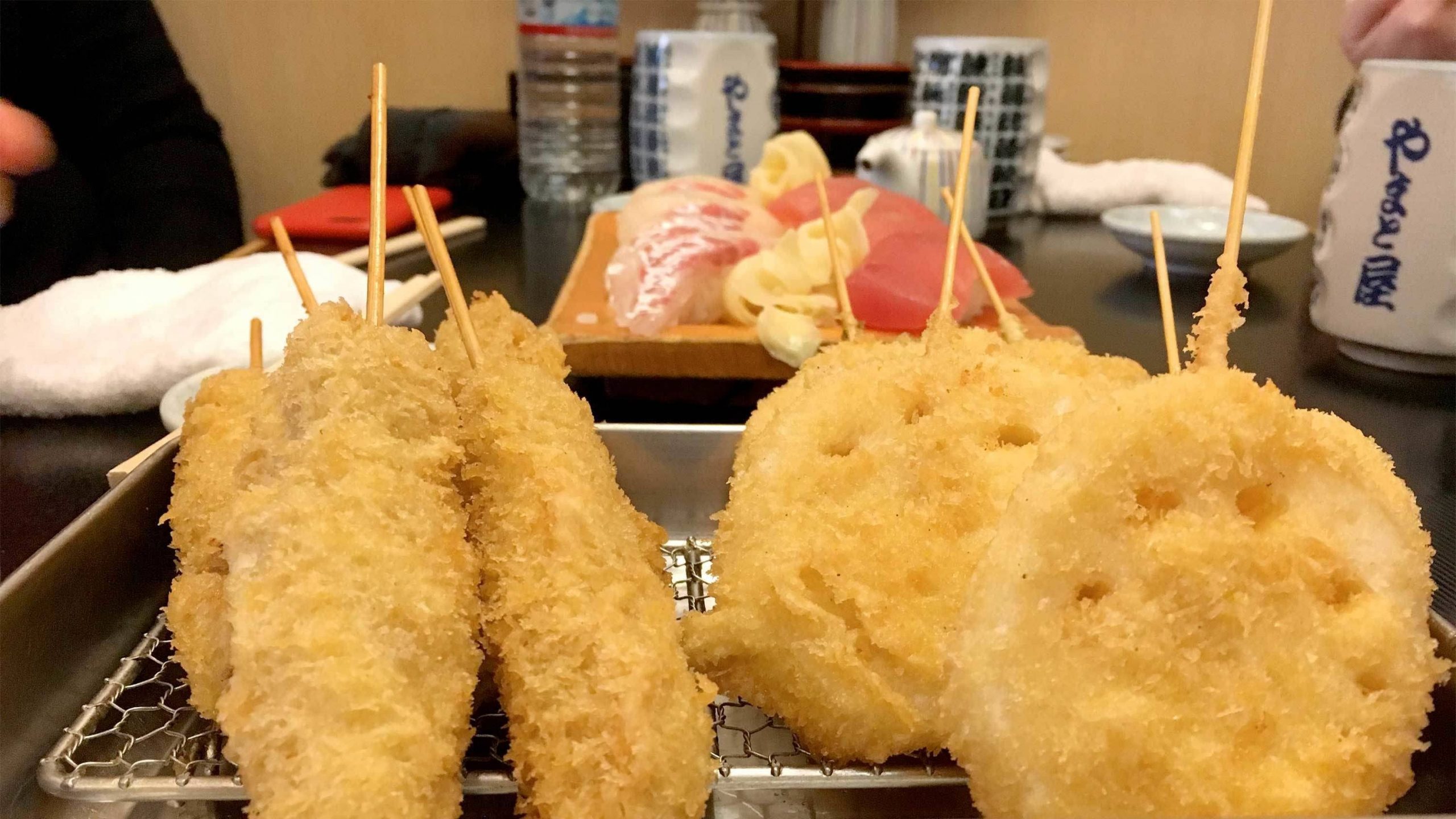 Deep fried food on a stick called kushikatsu found in Osaka