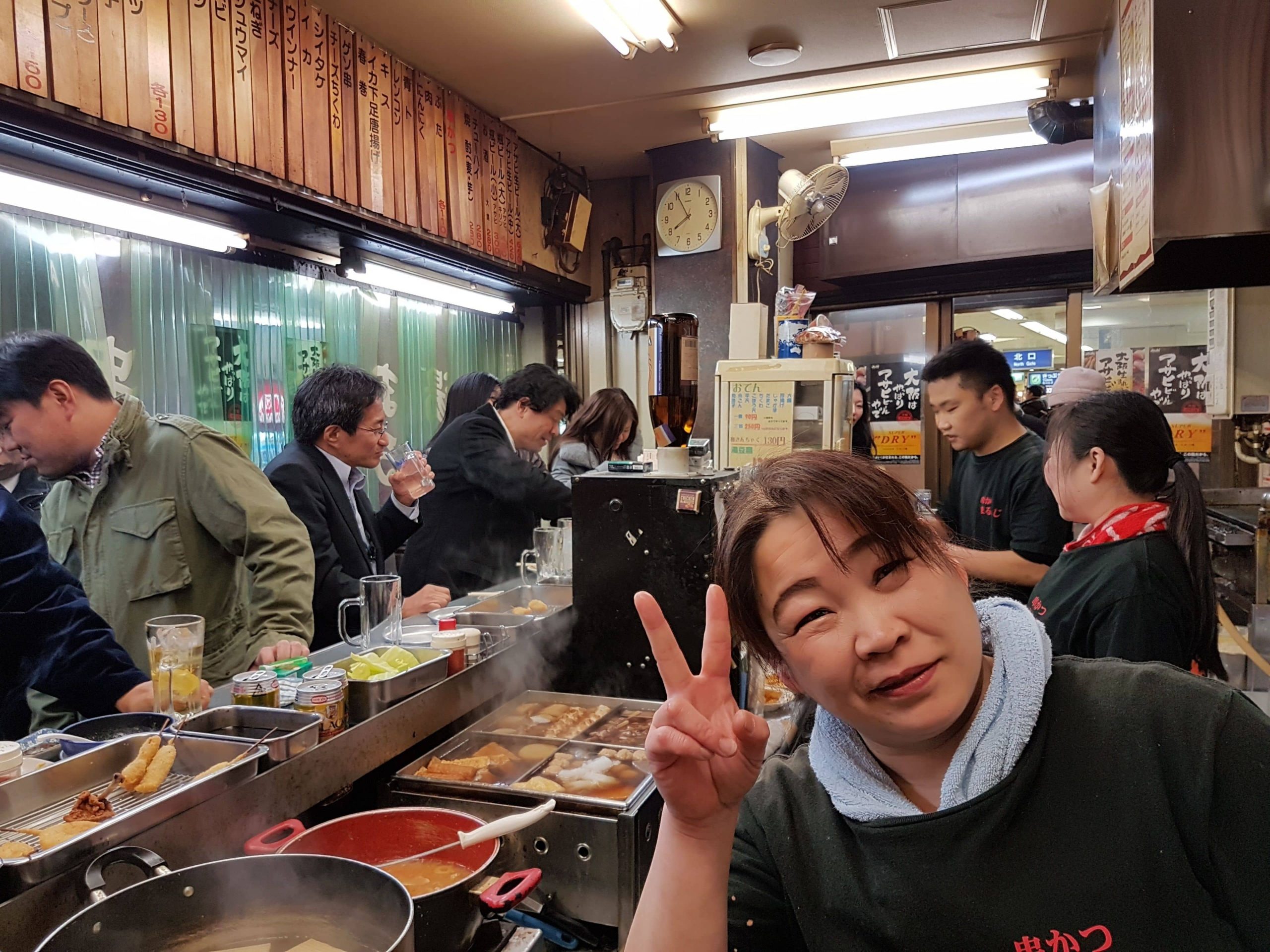 Feasting in a small local restaurant on an Osaka Food Tour