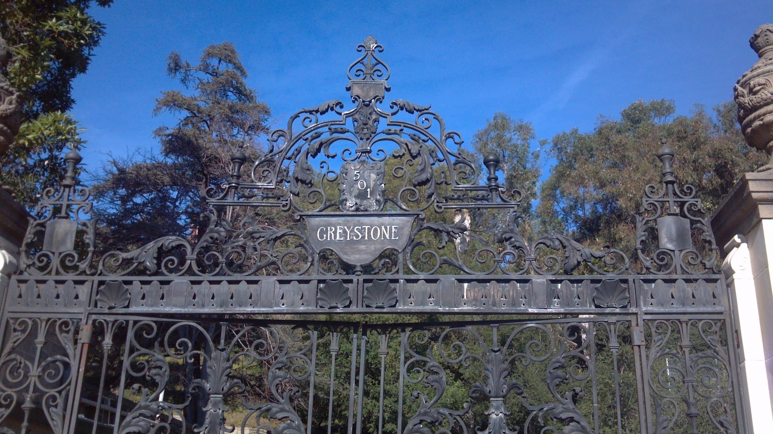 Greystone gates seen on a true crime tour in Los Angeles