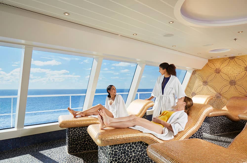 Cruise guests chatting at the Thermal Lounge in the Cloud 9 Spa Cruise guests having a Sap day at Carnival Cruise