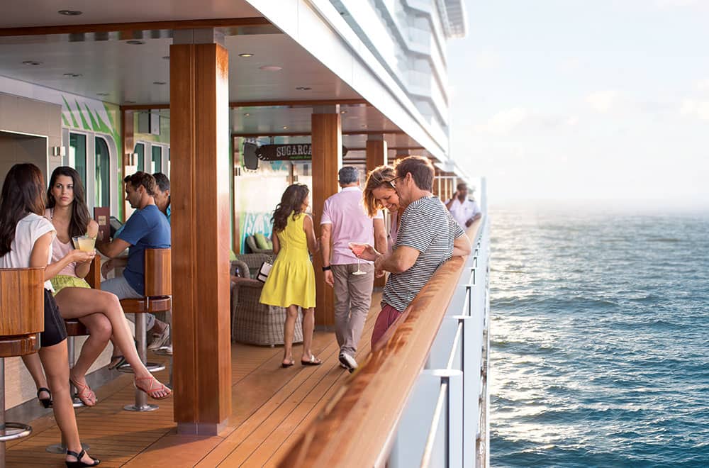 Guests walking along boardwalk at Norwegian Getaway