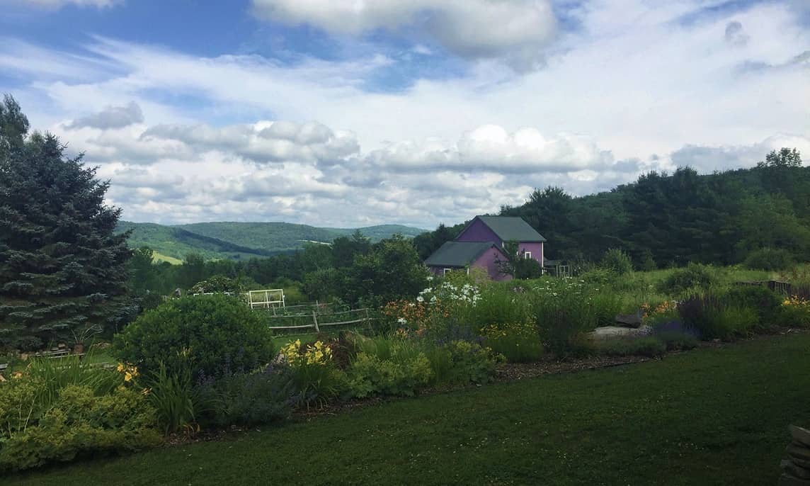 A small cabin in the beautiful green fields at a yoga retreat in New York. 