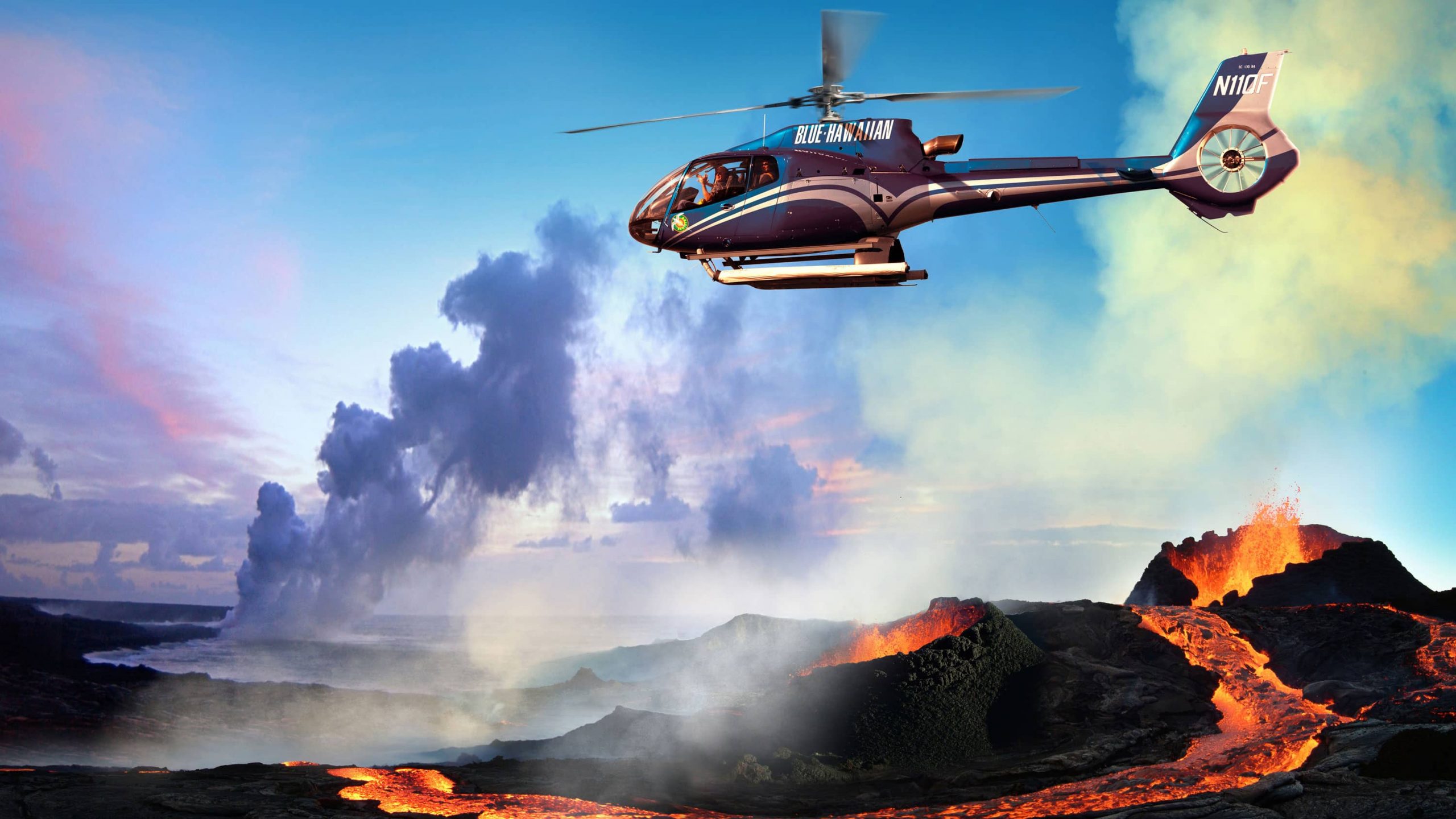 Helicopter flying near mouth of an erupting volcano