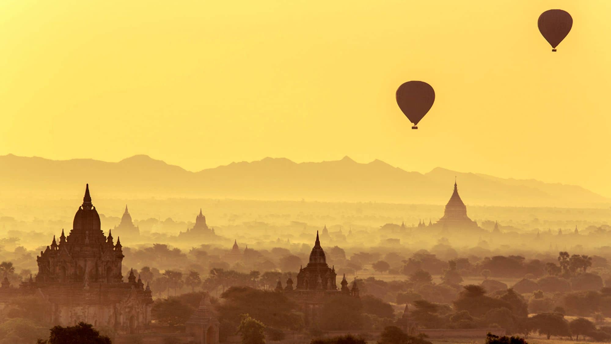 Hot air ballooning over Bagan while adventure traveling in Myanmar