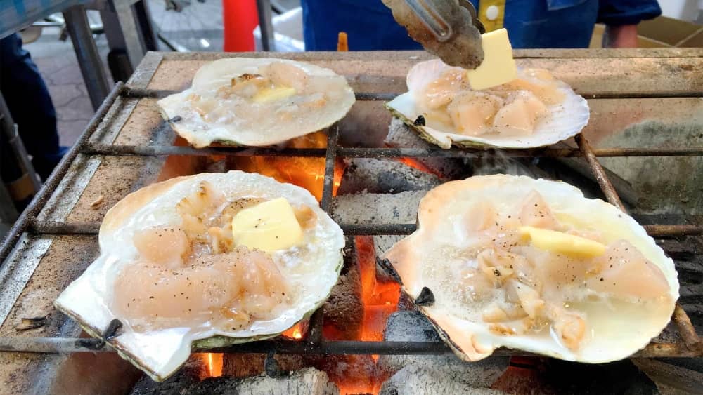 Large scallops grilled in the shell in Kamaishi