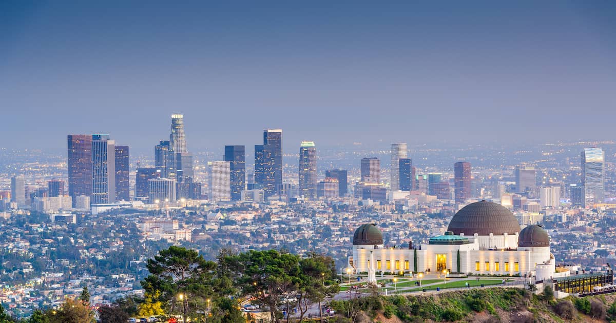 Los Angeles, California, USA downtown skyline from Griffith Park, a must-see stop along the way of a California road trip from San Francisco to Los Angeles.