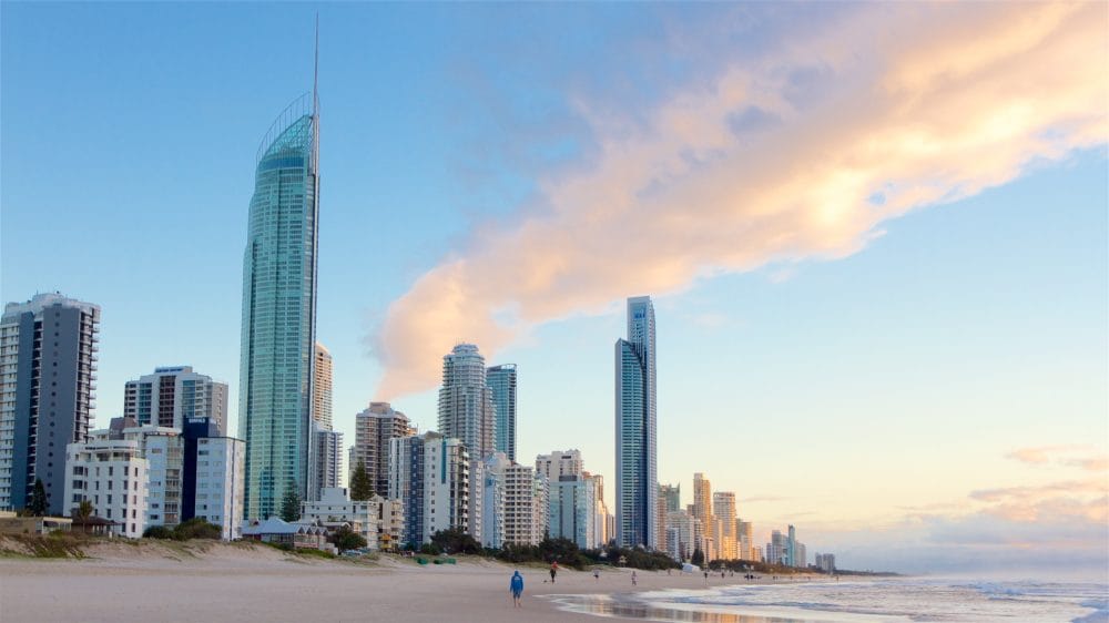 High rise buildings reach into the sky on the shore of the Gold Coast at sunrise