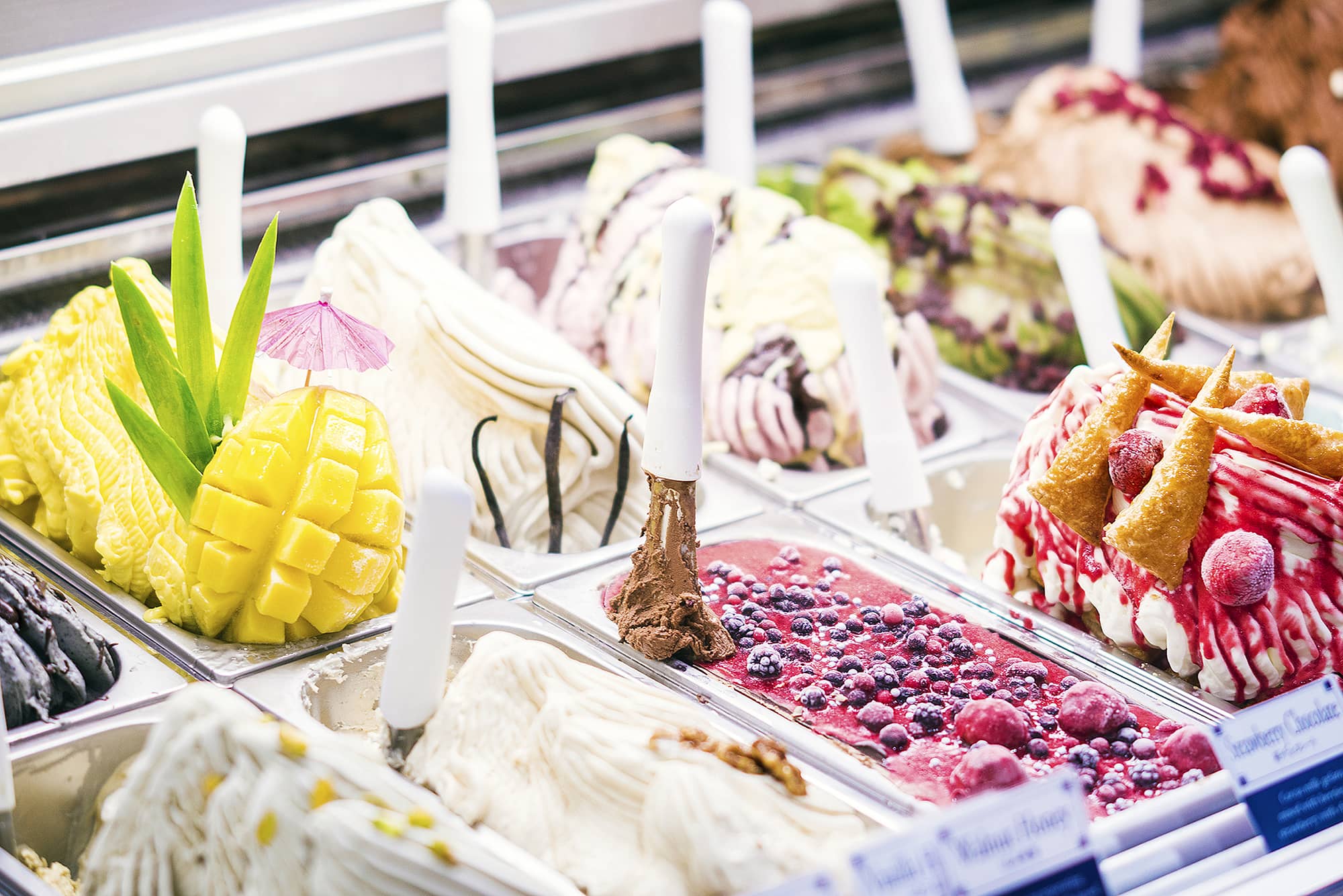 Many colorful flavors of gelato on display in Italy