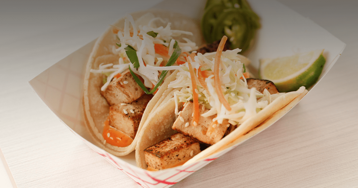 Two tacos with tofu, one of the interesting cheap eats deals offered at Marination, a popular eatery in Seattle, Washington.