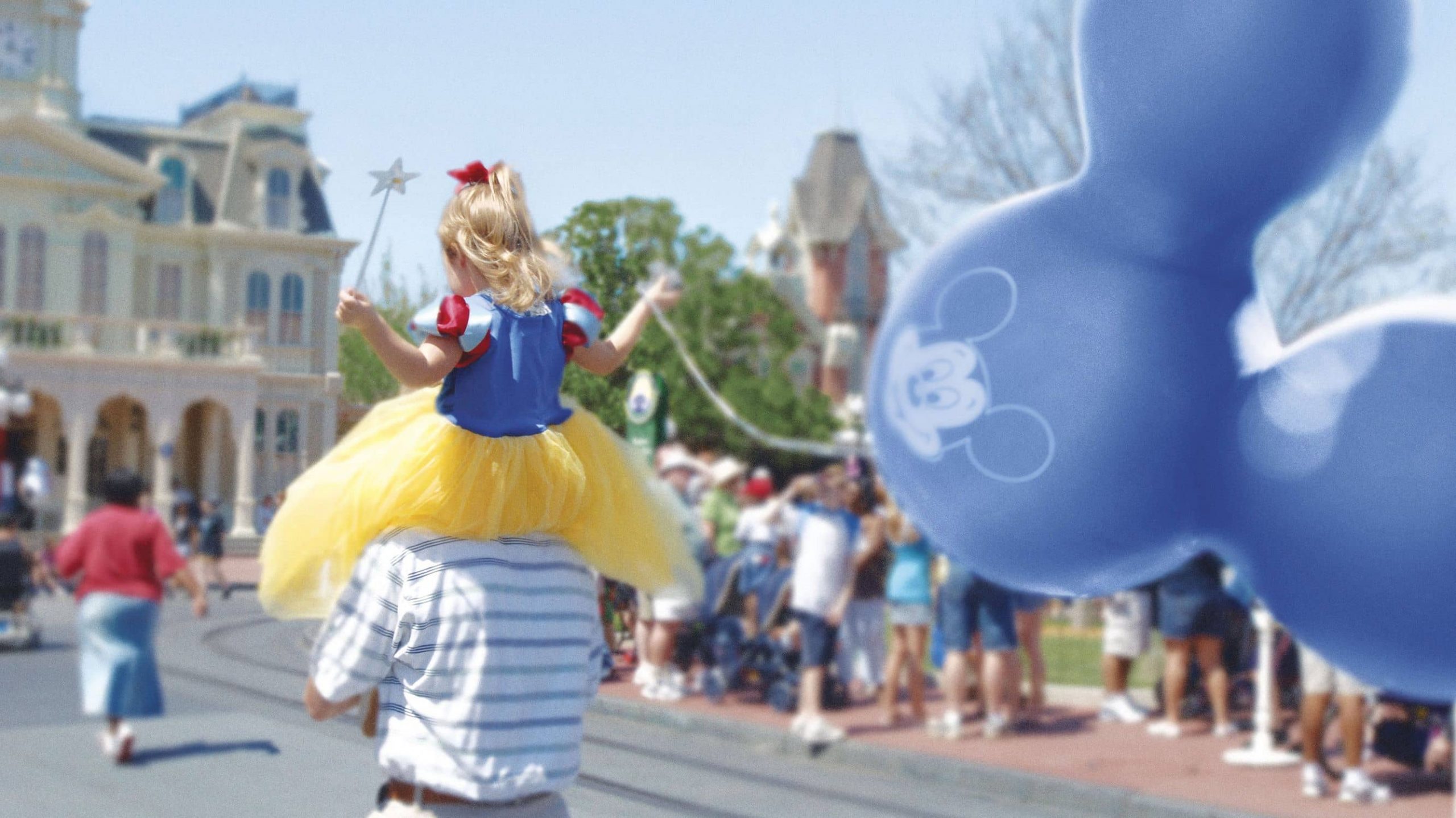 Girl celebrating Mickey's 90th Birthday Party at Disney World