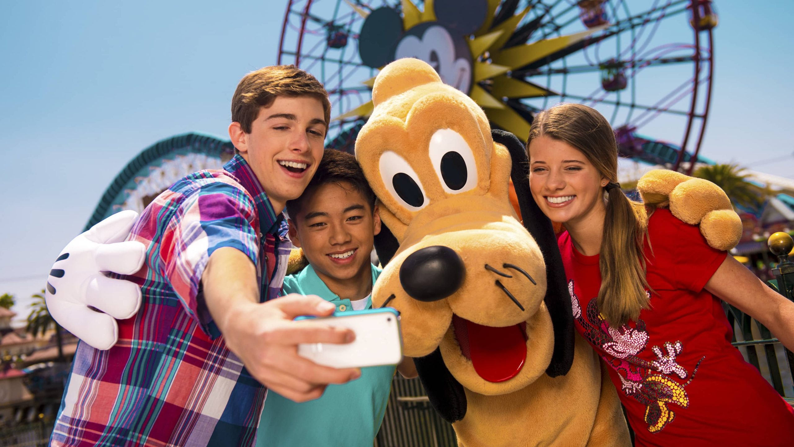 Kids hanging out with Goofy at Mickey's Birthday Party in Disneyland