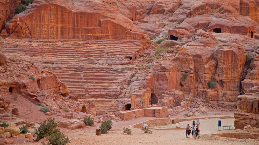 People walk through the Nabataen Theater in Petra, Jordan