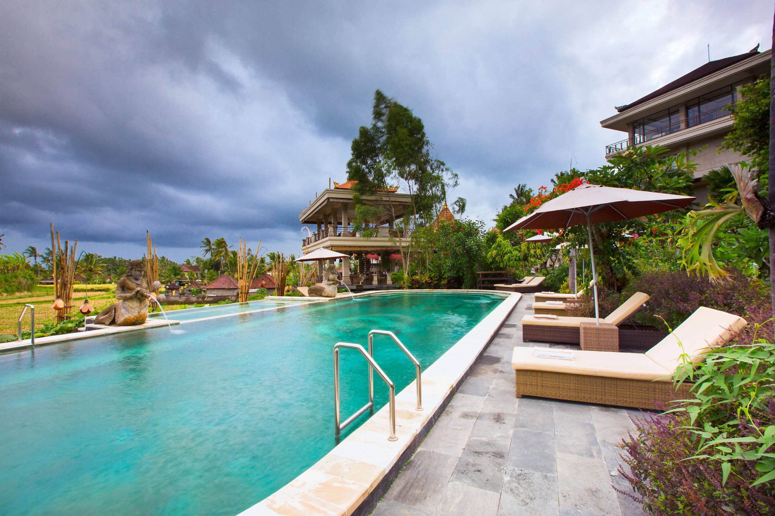 The beautiful outdoor pool area at the Om Ham Retreat & Resort in Bali.