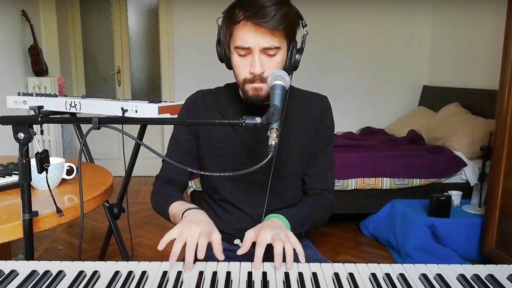 Man at a piano giving a private virtual concert