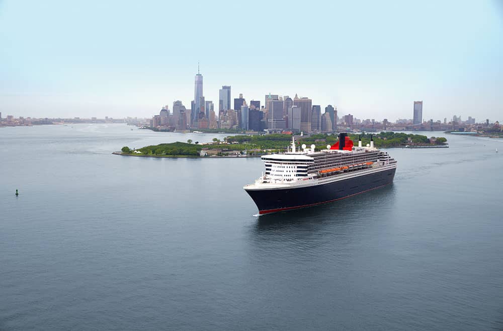Queen Mary 2 with New York city in the background Experience New York City with Queen Mary 2
