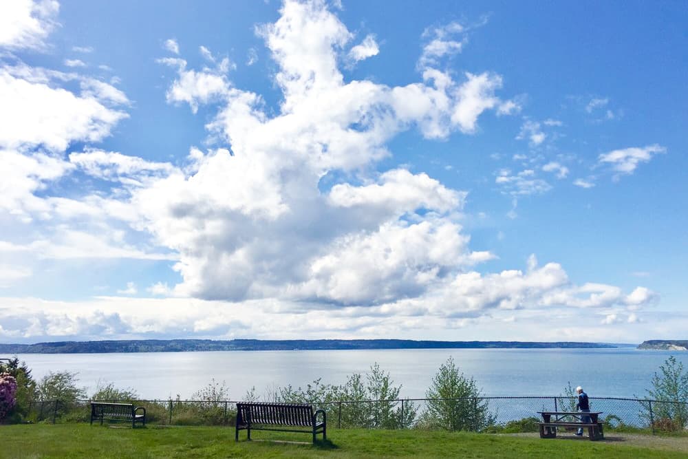 View of the Puget Sound on a still, sunny day in the staycation city Everett