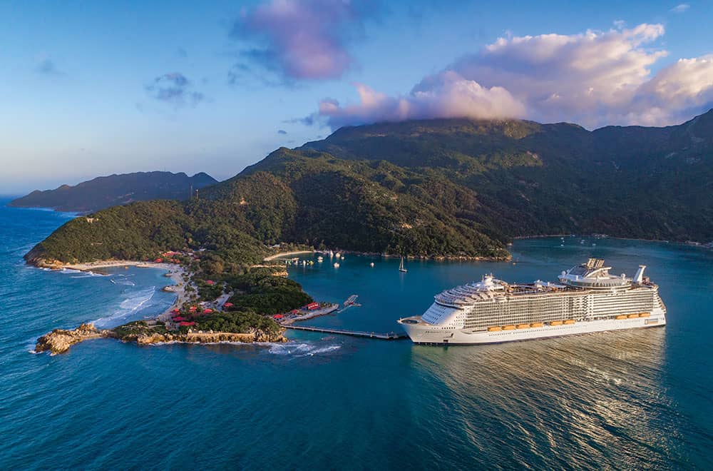 Harmony of the Seas docked in a Caribbean port Aerial view of Royal Caribbean ship in Labadee, Haiti