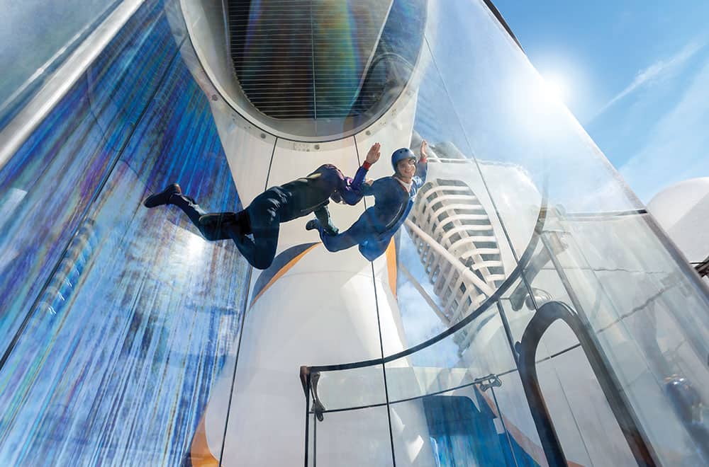 The skydiving simulator aboard the Odyssey of the Seas Guests having fun at the Skydiving simulator