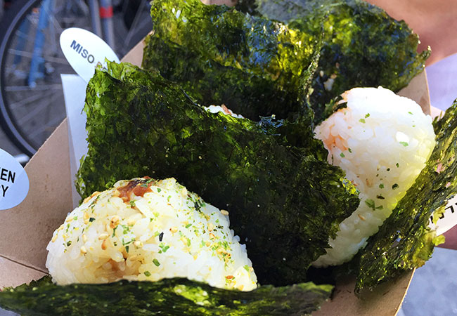 Box of seasoned rice and seaweed on food tour in Los Angeles