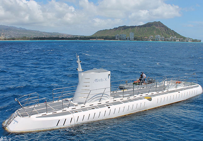 Submarine sits at surface of bay in Honolulu