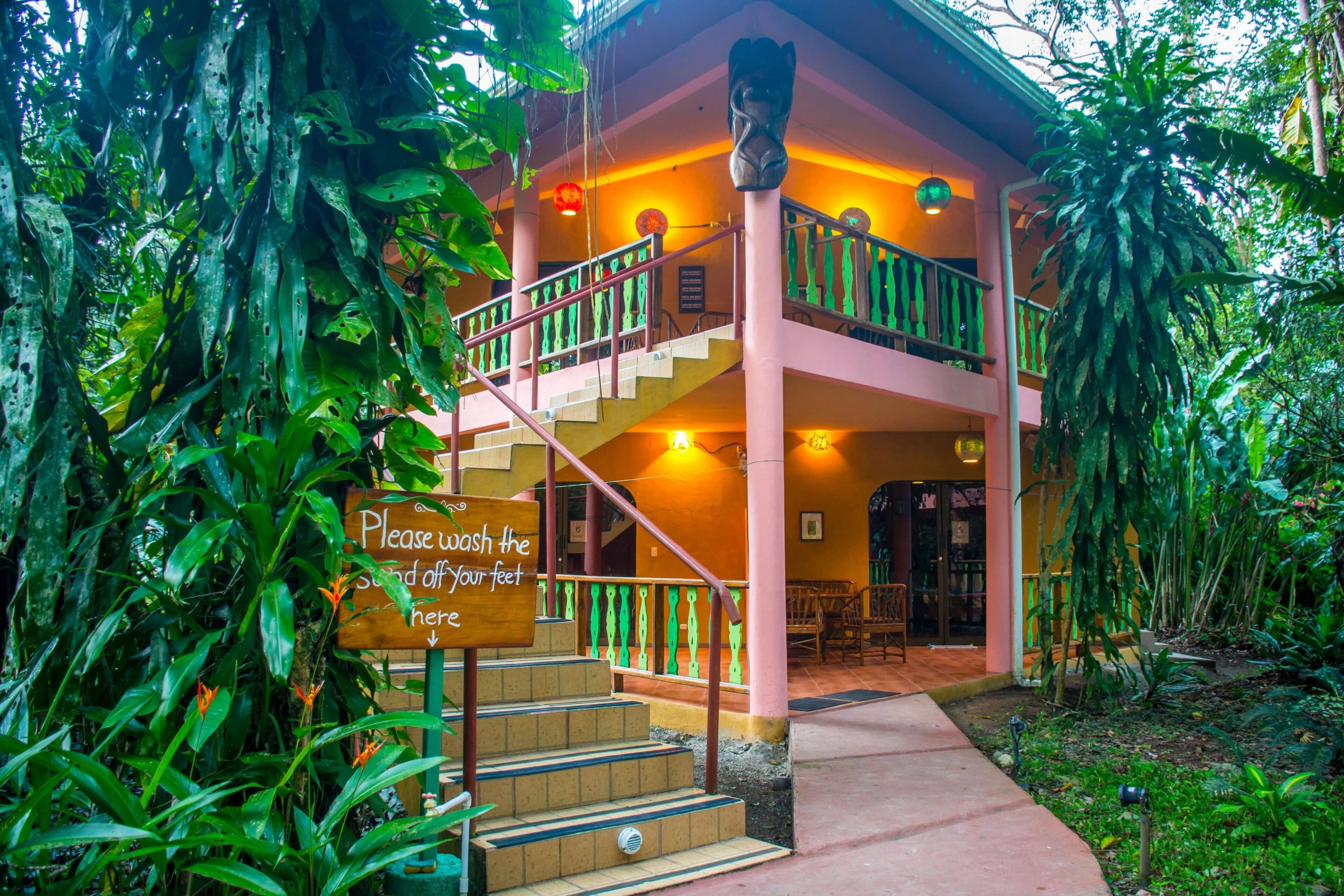 Beautiful lights turned on at dusk in the jungle at The Goddess Garden, a Costa Rican yoga retreat resort.