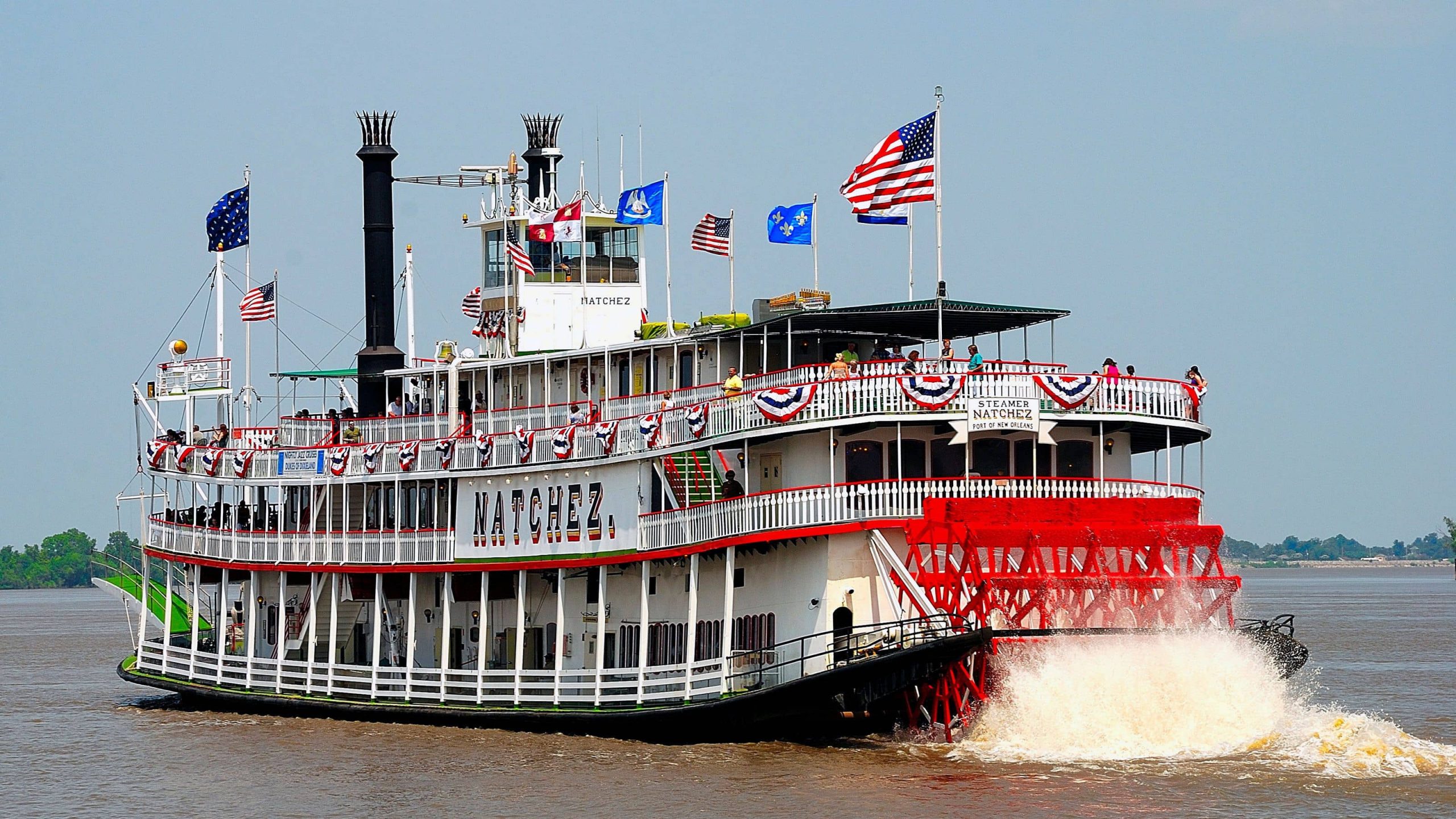 The Natchez steam powered paddle boat floating down the Mississippi River