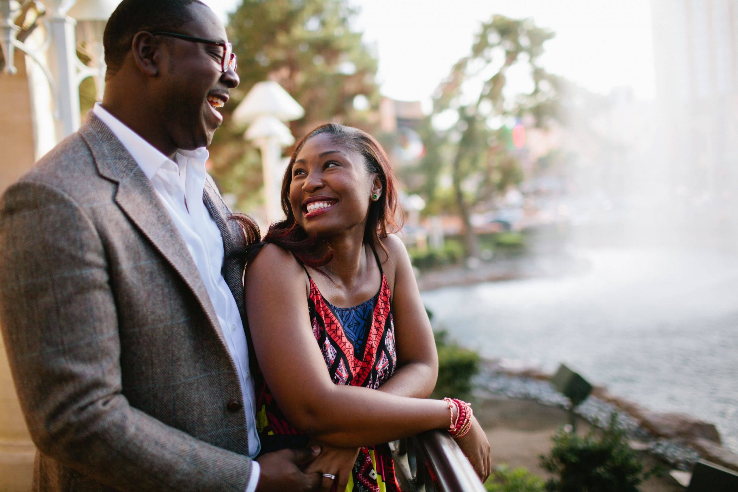 A couple smiling at one another taken by a Vacation Photographer in Las Vegas