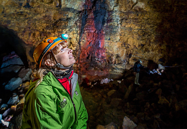 Hiking woman in Þríhnúkagígur volcano in Reykjavik