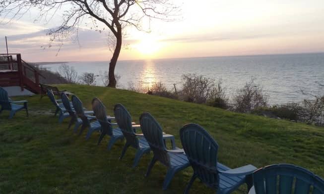 The water sunset view out from the West Babylon Yoga Darshana Center in Wading River, New York at their Yoga Retreat.