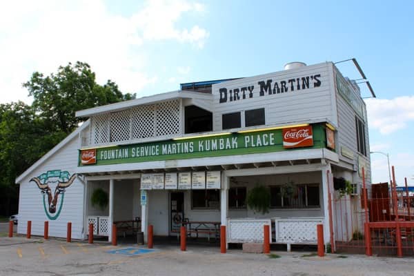 Dirty Martin's burgers are some of the best cheap eats in Austin. The white building has been here since 1926.