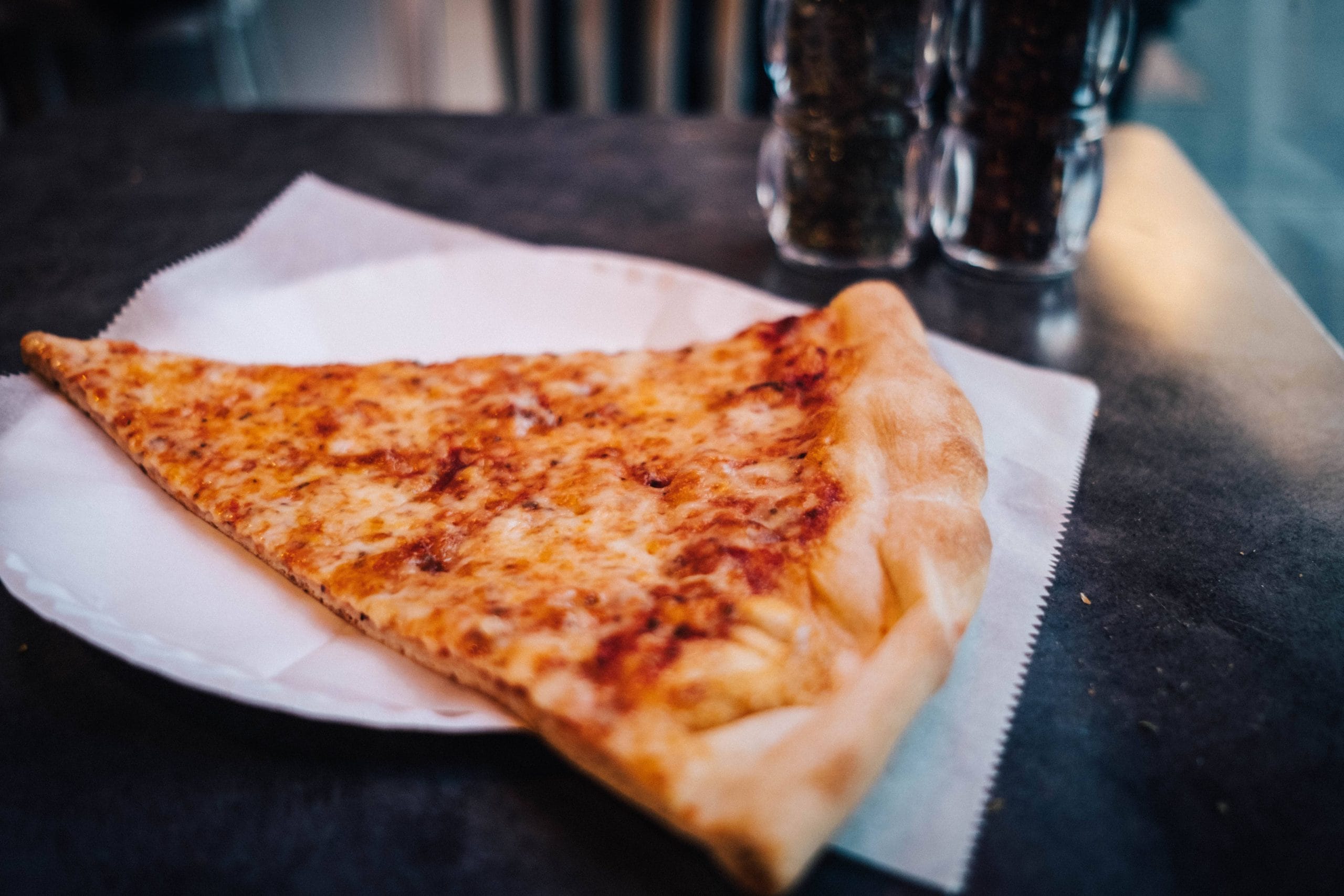 A slice of New York-style pizza, found at Home Slice in Austin, Texas.