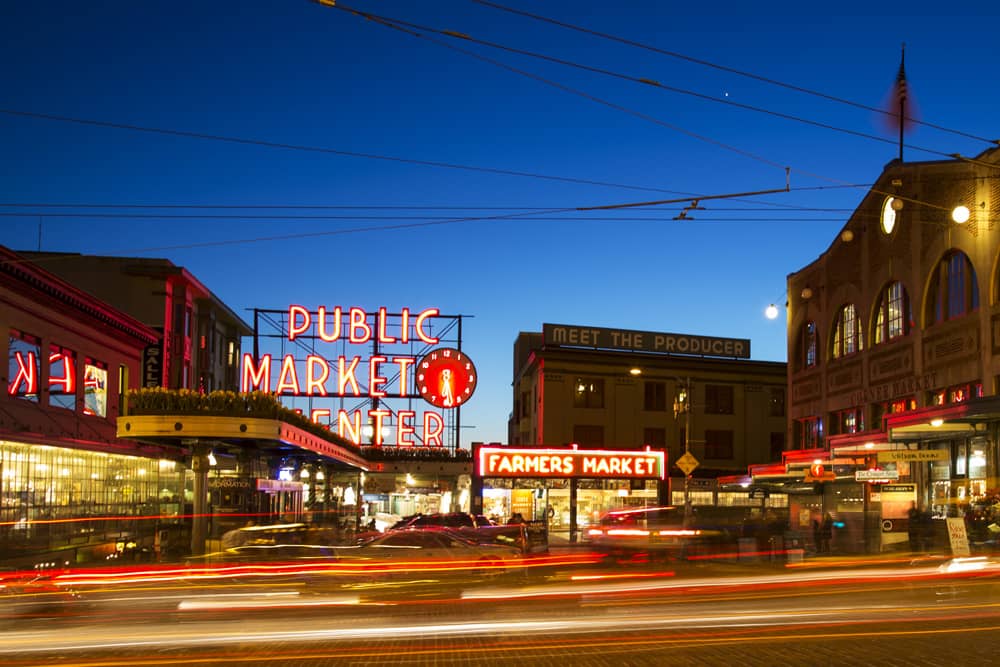 Pike Place Public Market, an outside attraction near the Bumbershoot festival. Pike Place Public Market at night, one of the top places to visit when attending Bumbershoot.