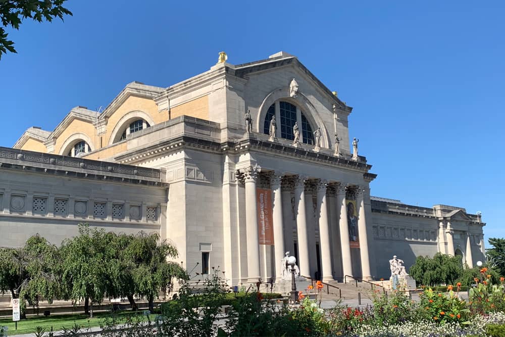 St. Louis Art Museum is a free date idea with no reservations needed. St. Louis Art Museum, a historical building with stone columns and gardens in the front lawn—a free date idea with no reservations needed.