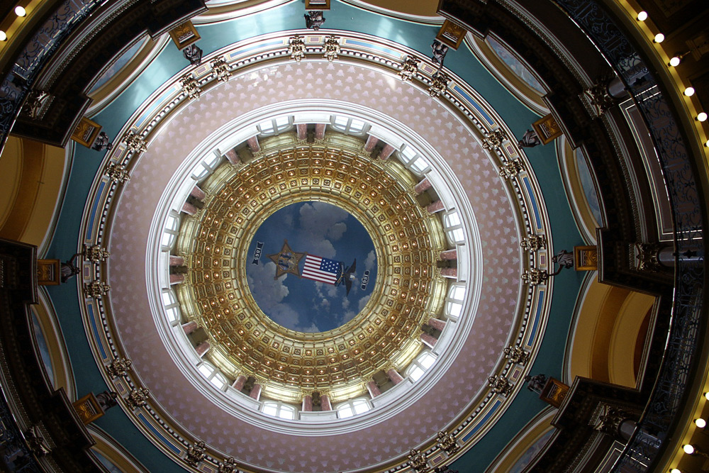 Looking up toward the inside main rotunda in the Iowa State Capitol building in the staycation city Des Moines
