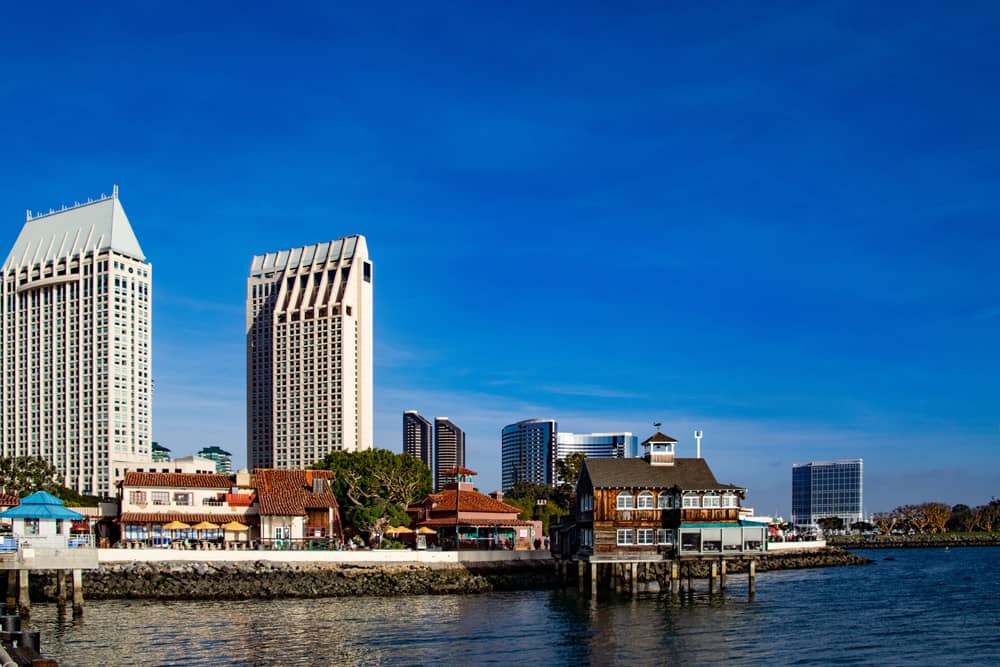 A view from the water, overlooking the buildings along Seaport Village, a kid-friendly free attraction in San Diego.