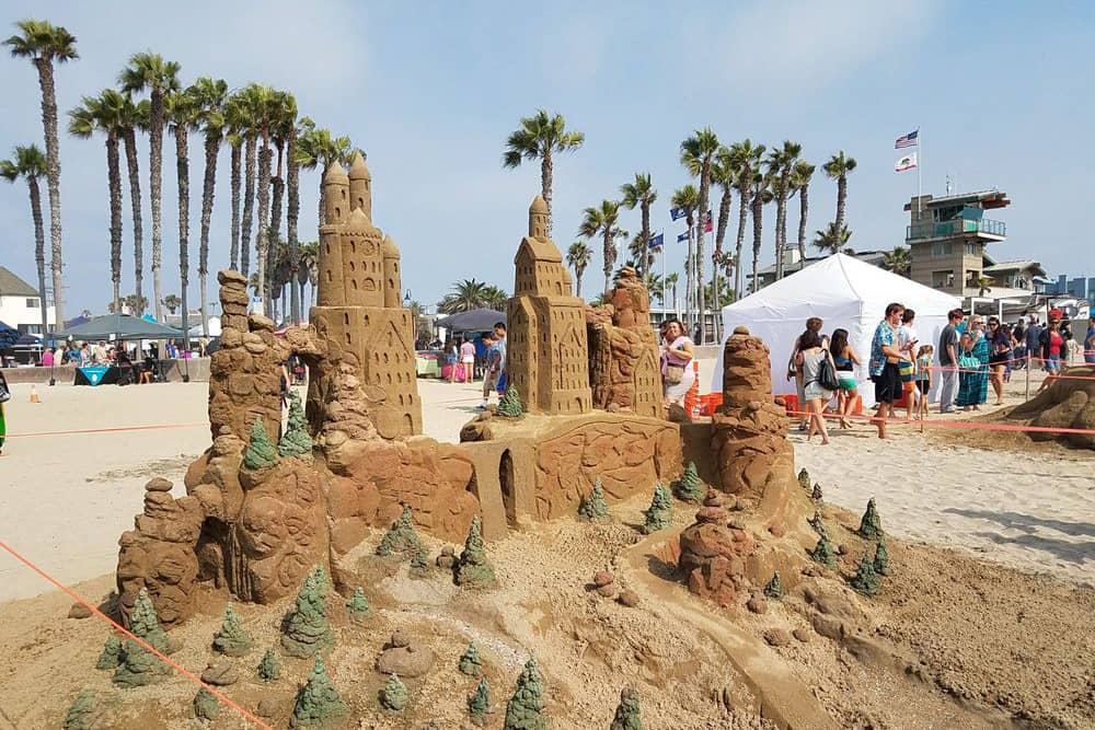 Elaborate sand sculpture of a castle gate competing at the Imperial Beach Sun and Sea Festival—a free event for kids near San Diego