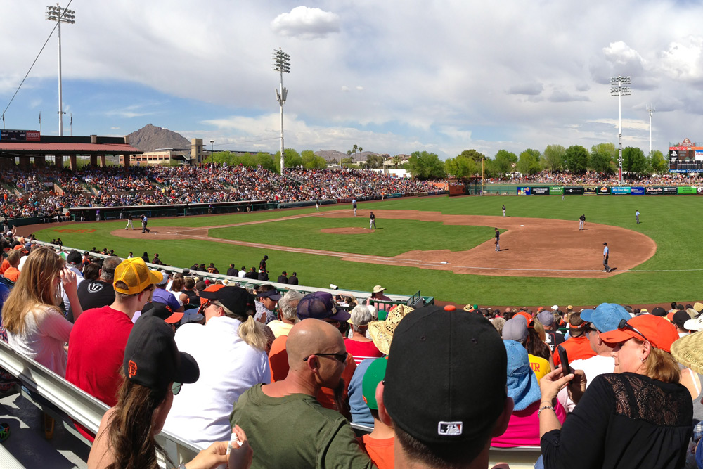Arizona Spring Training during February and March at an outdoor baseball field at Scottsdale Stadium.