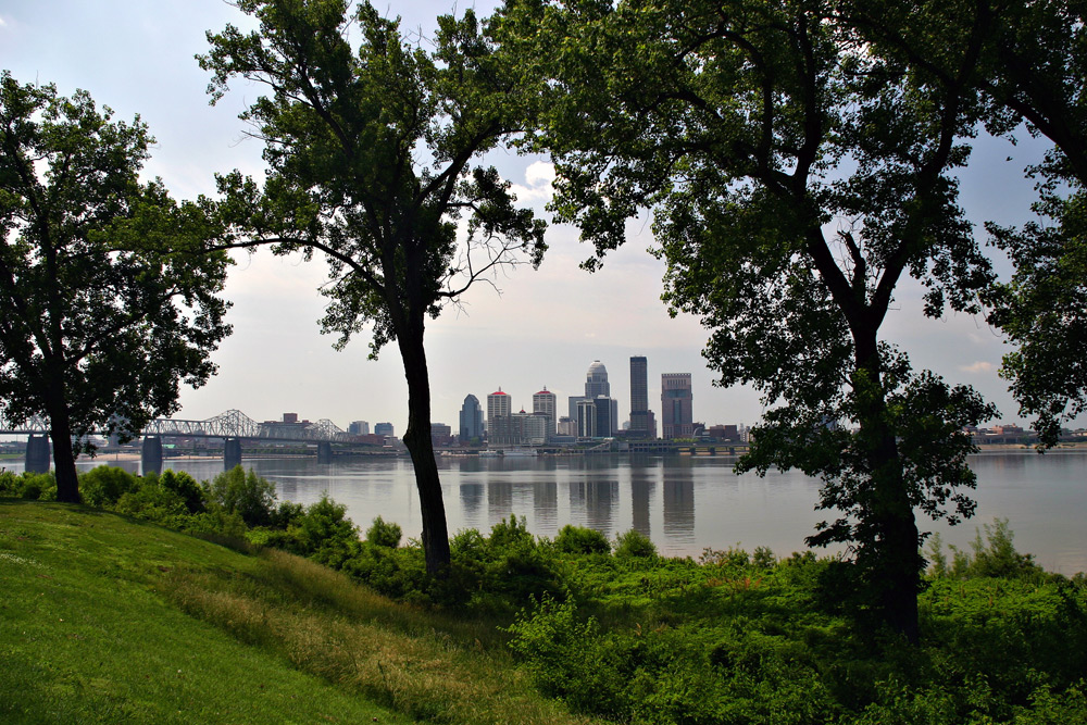 Louisville, Kentucky skyline from a green park vantage point — a top destination to stay a week or more