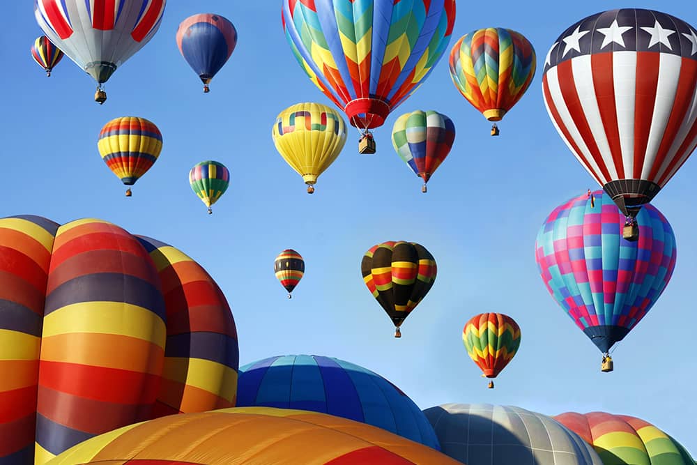 Hundreds of colorful hot air balloons fill the sky at the Albuquerque International Balloon Fiesta.