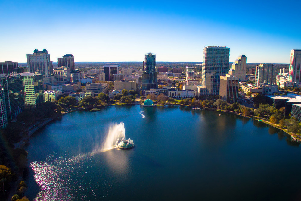 Downtown Orlando skyline over Eola Lake — a top destination to stay a week or more