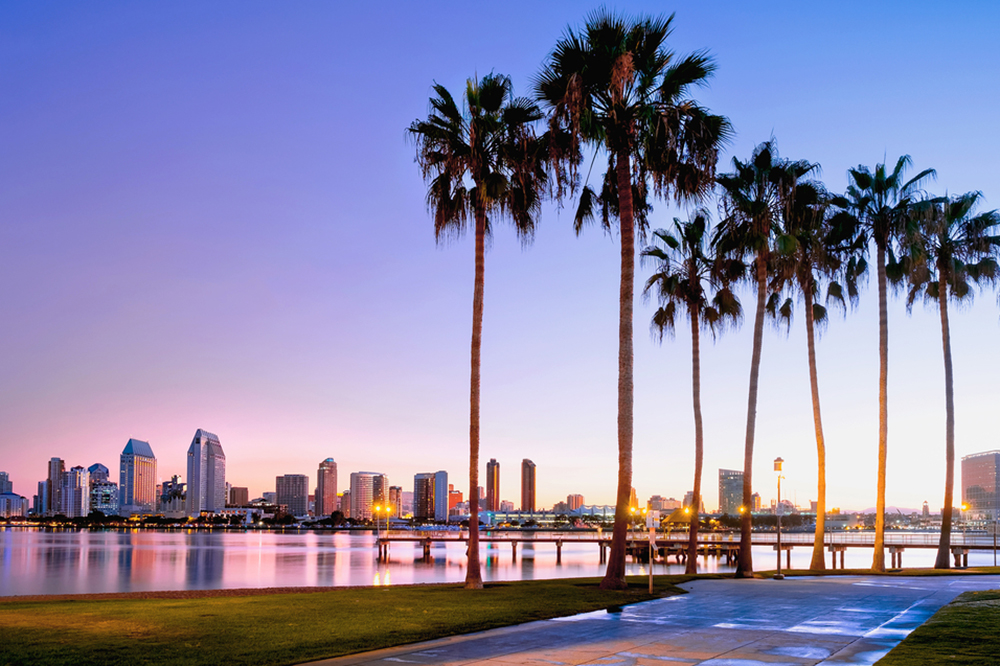 sunset over the harbor with San Diego skyline in the background