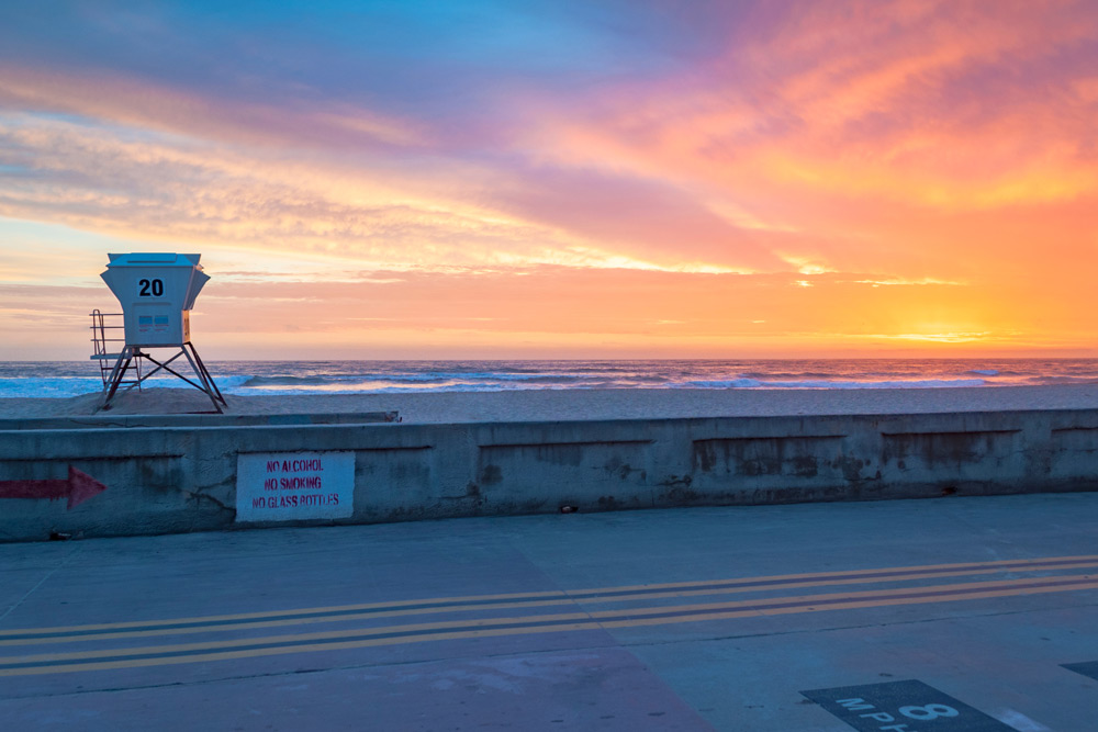 Mission Beach Boardwalk at sunset, overlooking the Pacific Ocean--a great place for a San Diego date.