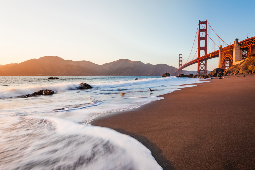 Marshall's Beach, a secret romantic spot in San Francisco with views of Golden Gate Bridge.